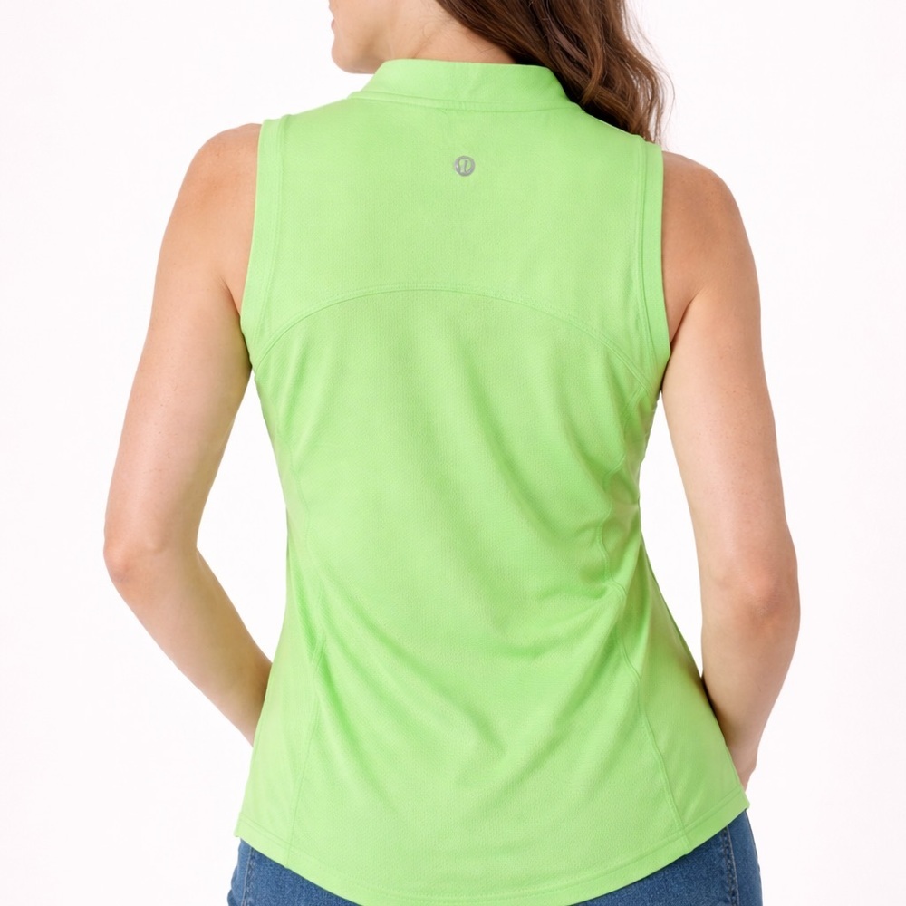 Bright neon green Lululemon sleeveless athletic top with half zip front. - Picture 2 of 7